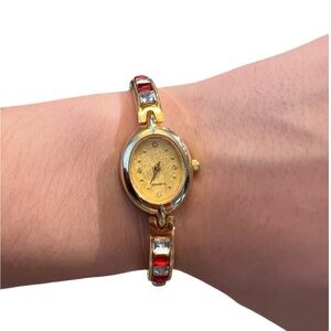 Elegant Gold and Red Women's Watch